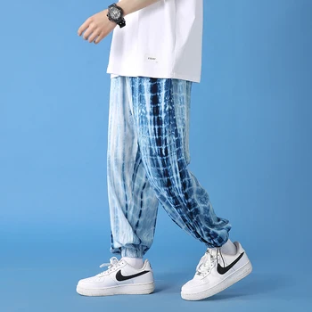 Корейската версия Тенденцията на мъжките свободни спортни панталони, японски улични въображаемо панталоните за джогинг, ежедневни панталони Големи размери в стил Харадзюку